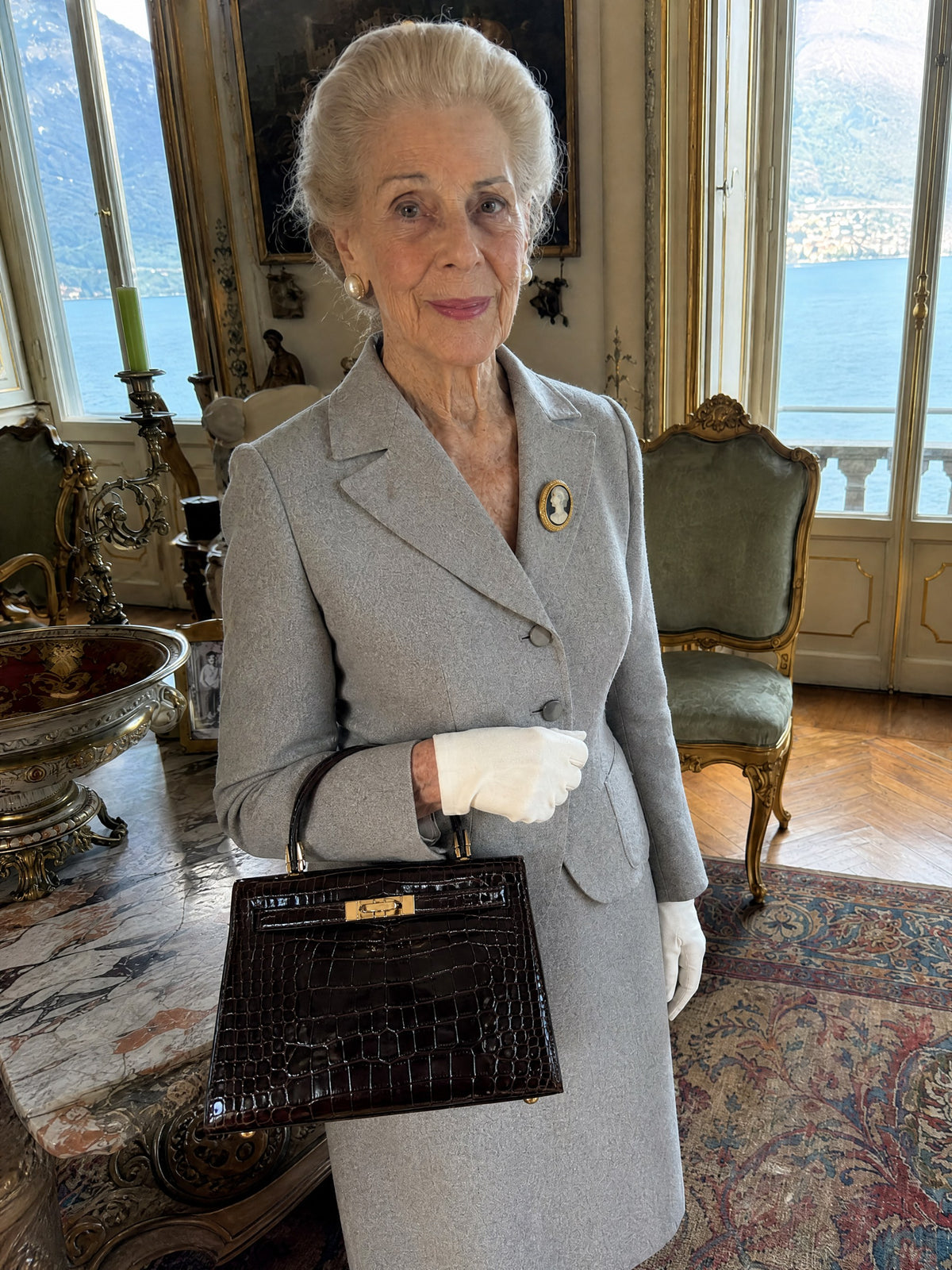 Contessa Silvana carrying the Contessa Bag in coffee